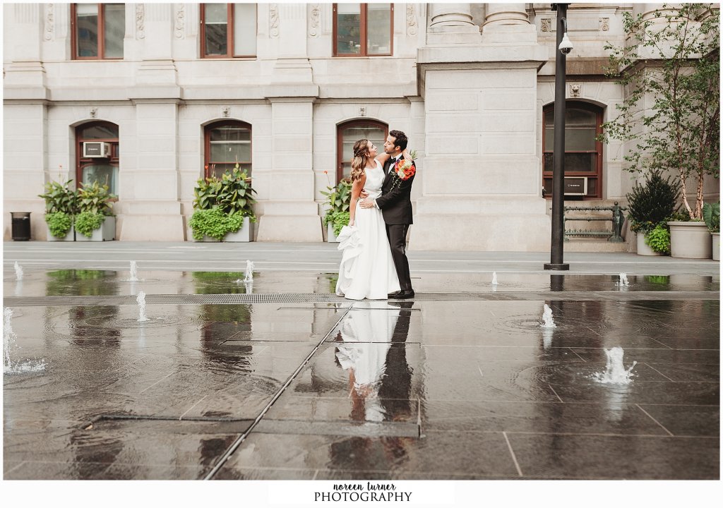 Bride and groom portraits at Dilworth Park for a fall Reading Terminal Market wedding